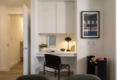 Built-in desk nook with cabinetry in an Abode rental home